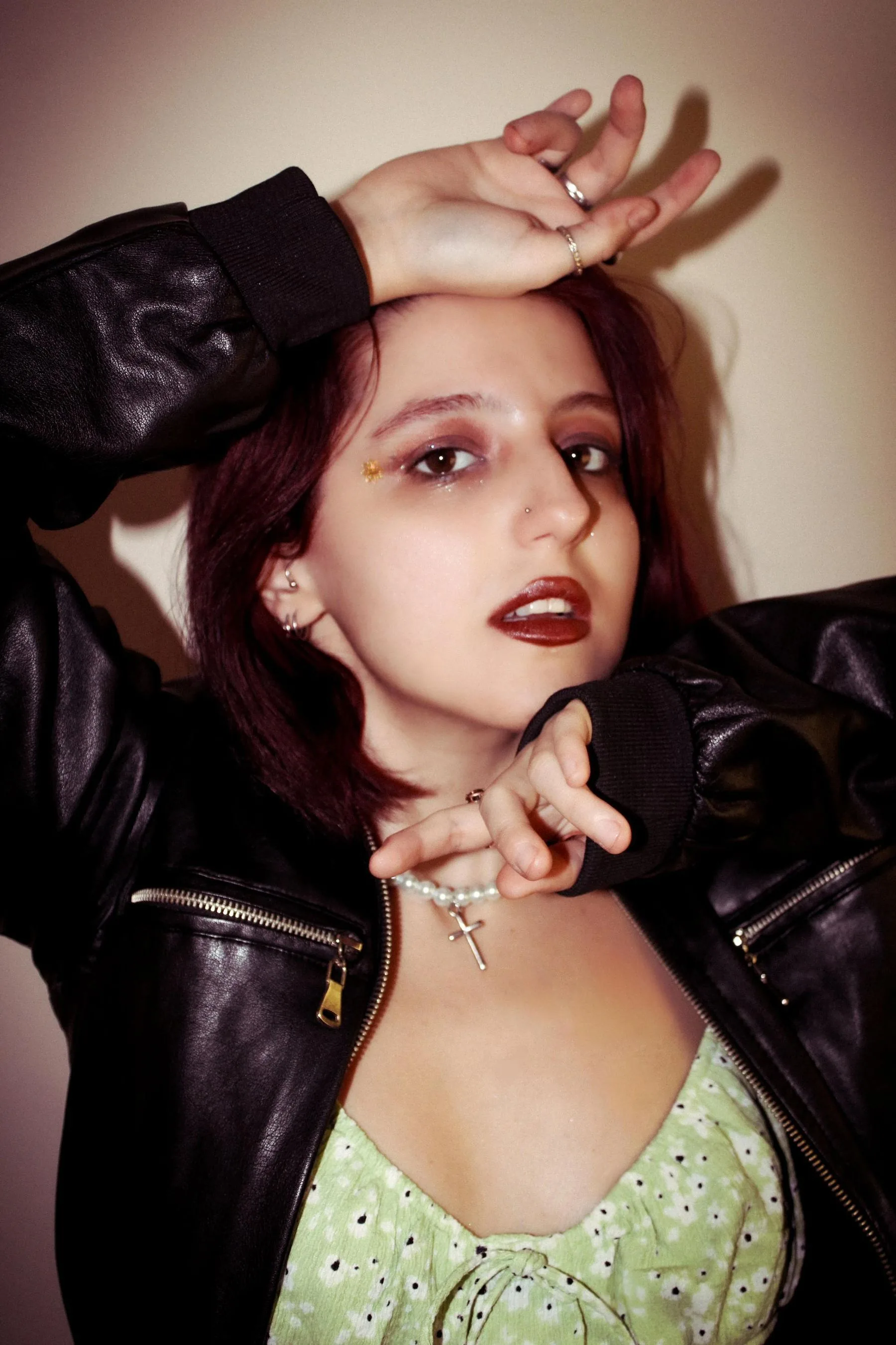 Portrait of a woman wearing a black leather jacket